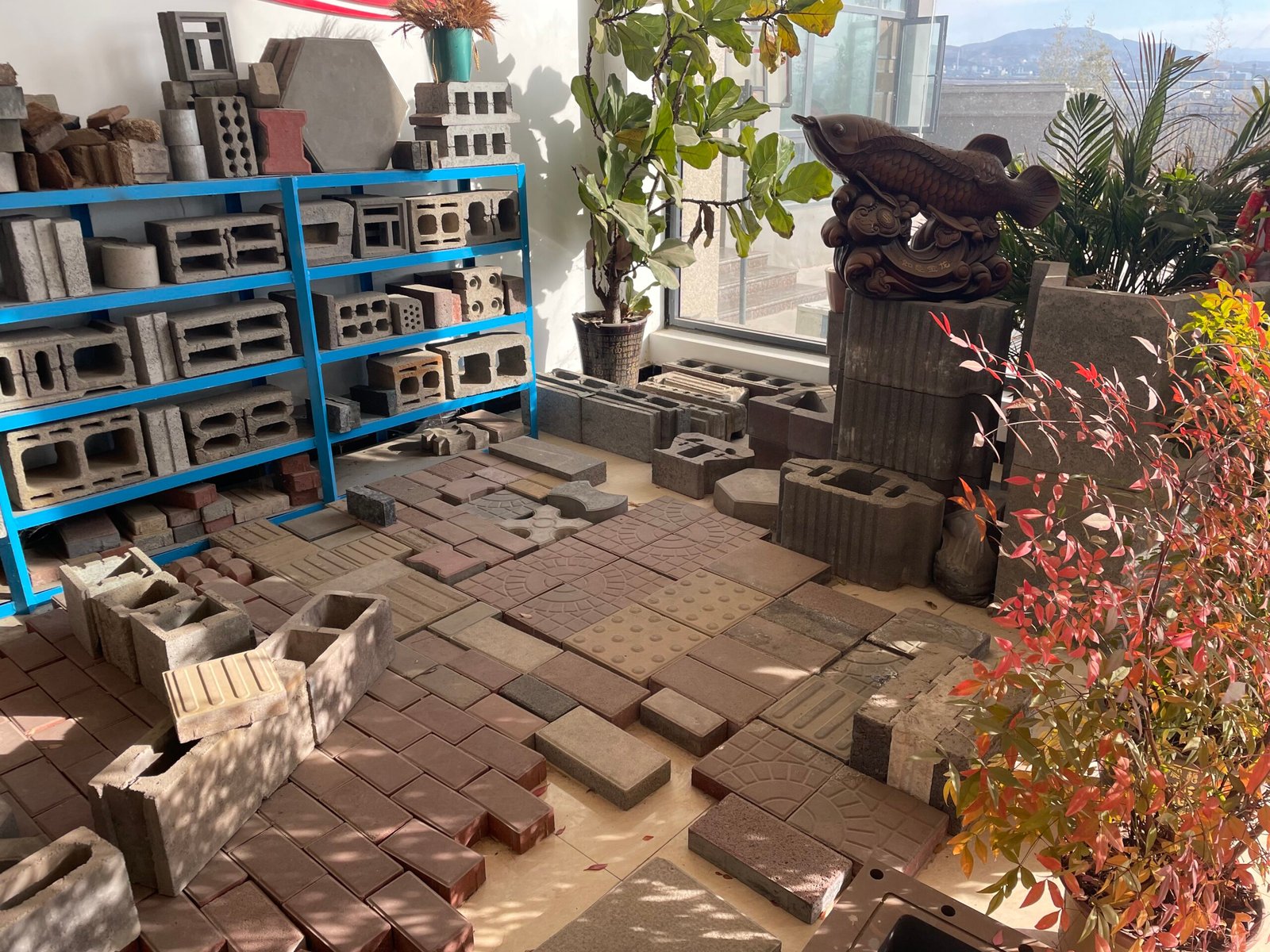 Original photograph showing concrete paving slabs and wall block samples
